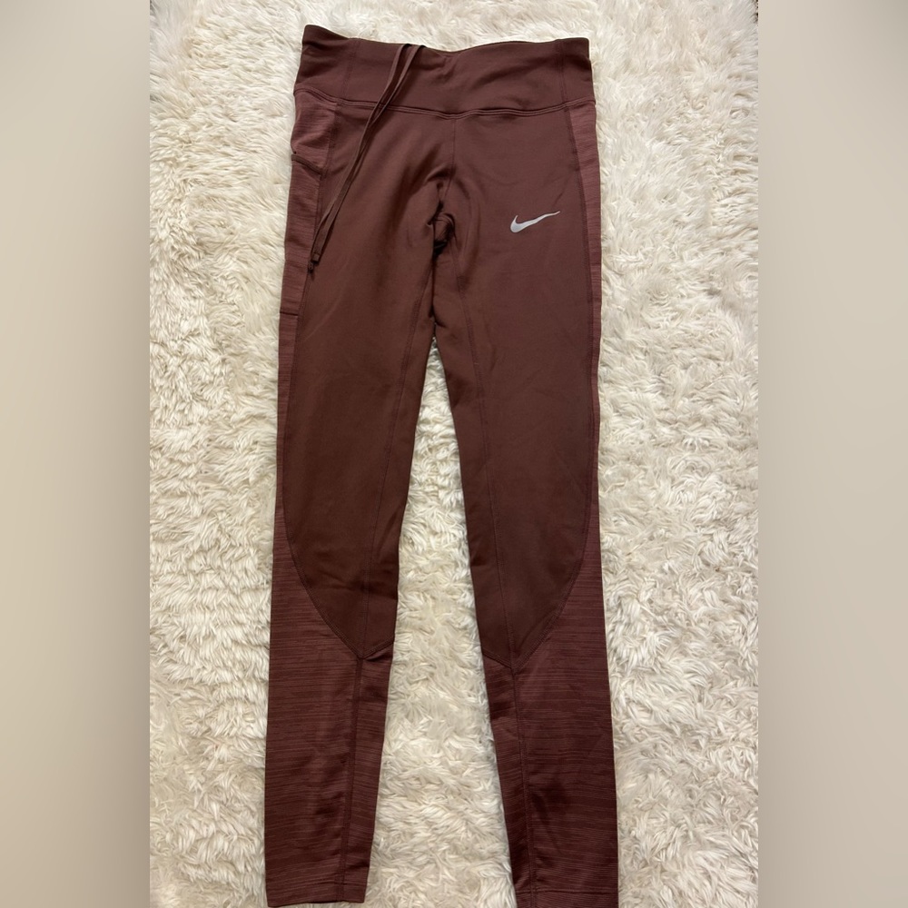 nike dry fit leggings in dark purple/ pink